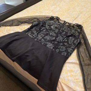 I’m selling a black lace shirt and 2 one piece.